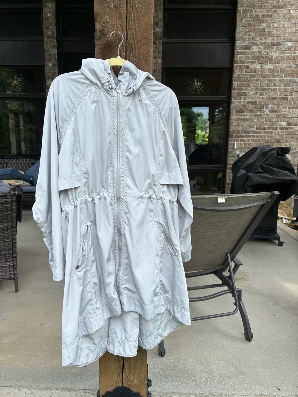 Light Gray  Athleta Women's Hooded Anorak Rain Jacket.